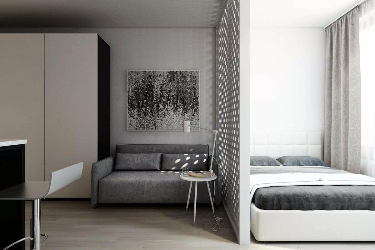Современный и стильный дизайн квартиры-студии с кроватью